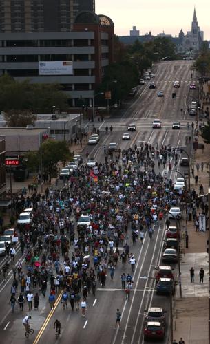 Protesters spend day at police headquarters