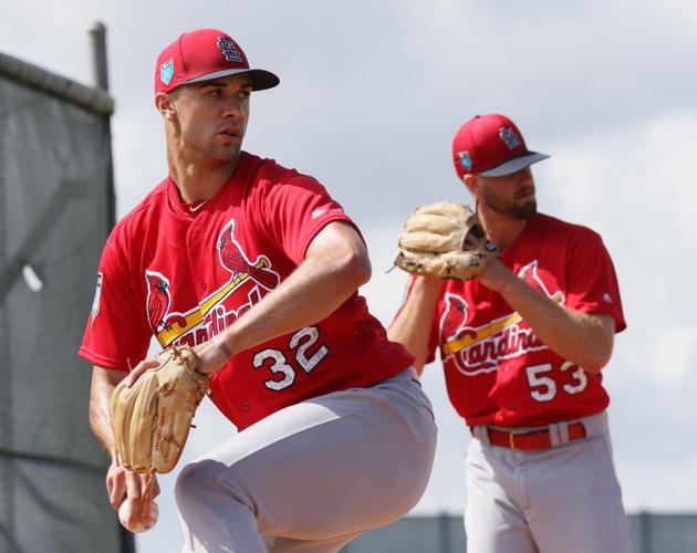 Photos Cardinals open camp with pitchers throwing first bullpen session