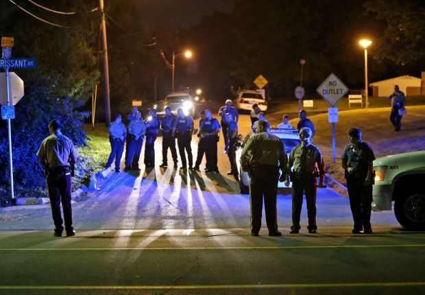 Ferguson police officer shot in the arm