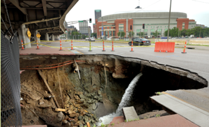 Video: Broken water mains causes sinkhole in St. Louis