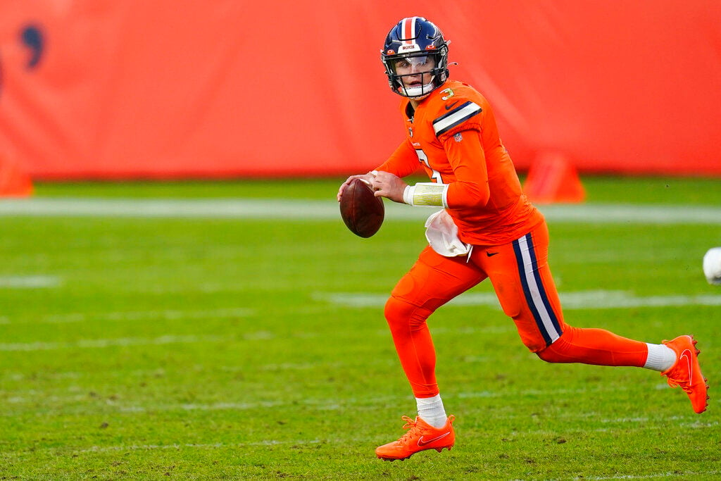 Denver Broncos tight end Albert Okwuegbunam runs against the Los Angeles  Rams during the first half of an NFL preseason football game Saturday, Aug.  26, 2023, in Denver. (AP Photo/Jack Dempsey Stock