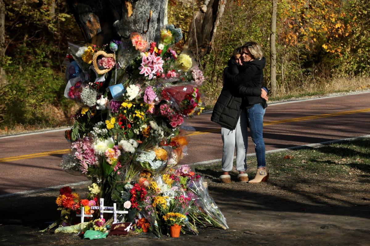 Hundreds visit the memorial site of car crash where 3 teens died