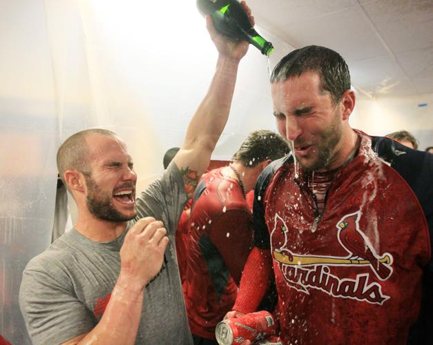 Wainwright gets doused with champagne after NLDS in 2011