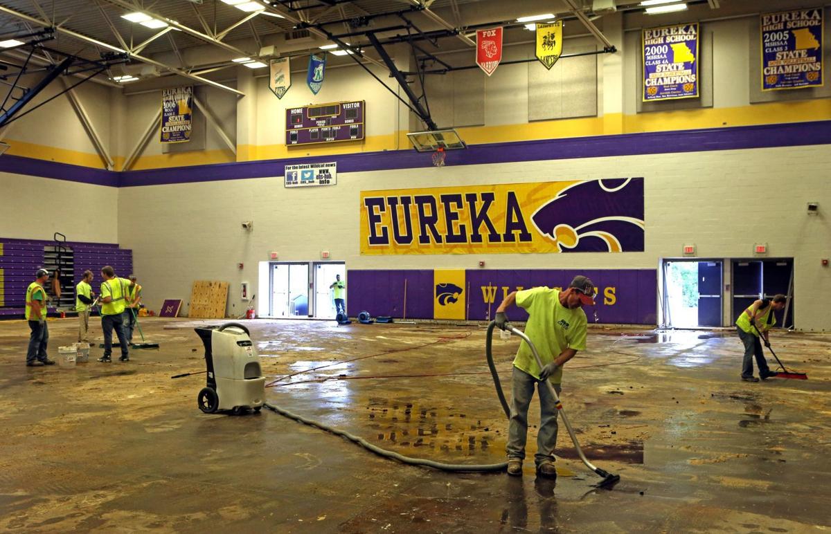 For 22 hours, four men fought back the flood at Eureka High School