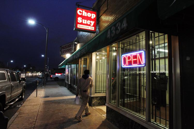 Customer enters Mandarin Inn on Natural Bridge Road