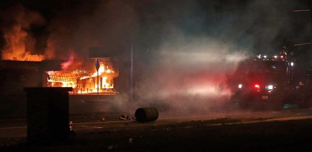 Riot breaks out, store burned