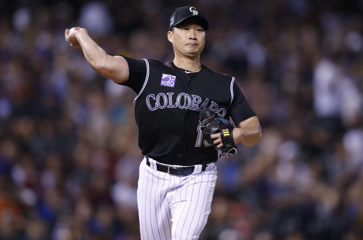 N.L. Wild Card: Rockies Outlast Cubs With a Clutch Hit From an