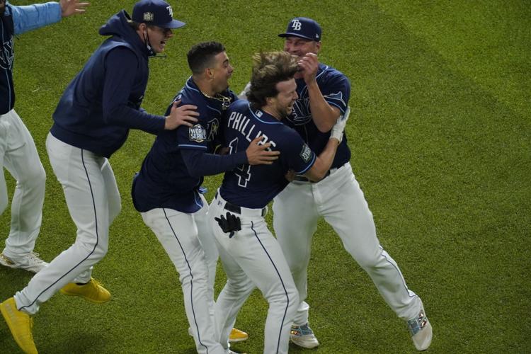 Rays walk off for win over Dodgers to even World Series