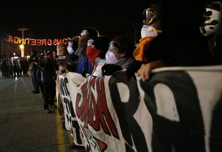 Communist activists rally, arrests made in Ferguson