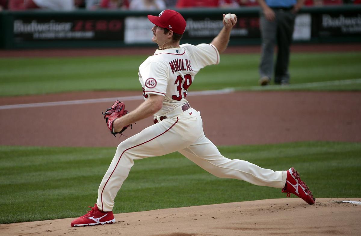 Mikolas hurt in return, Molina homers, Cards top Cubs 2-1