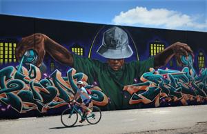 Paint St. Louis puts new art on an old downtown St. Louis wall