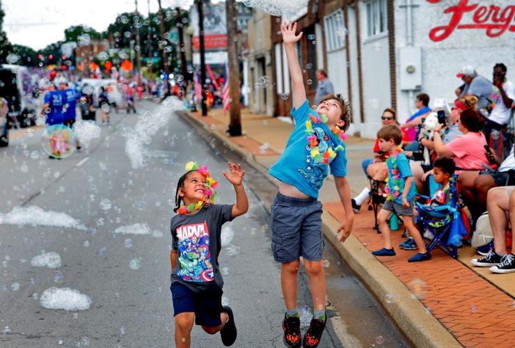 Bubbles float in Ferguson on Fourth of July