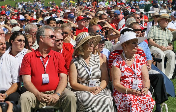 Former St. Louis Cardinals manager Whitey Herzog and wife Mary Lou wave to  friends during a parade up Main Street in Cooperstown, New York on July 24,  2010. Herzog will be enshrined