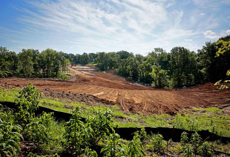 Homeowners blame half-developed McBride Homes land for excessive flooding