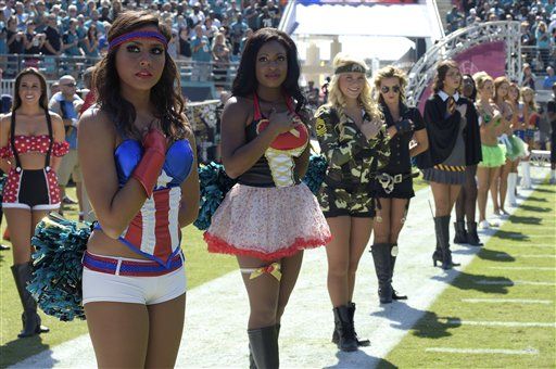 NFL cheerleaders dress offensively in the spirit of Halloween