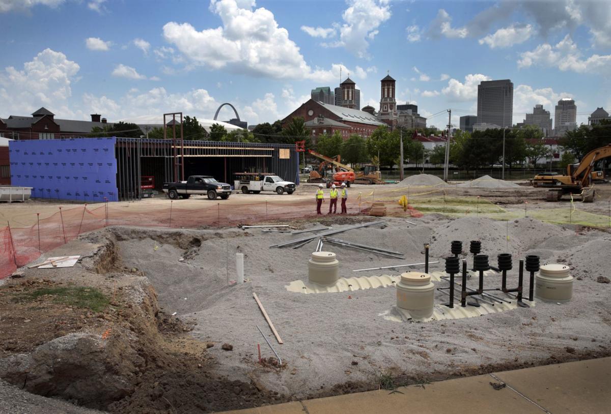 Grocery store, gas station rise north of downtown
