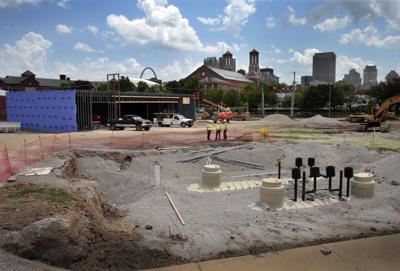 Grocery store, gas station rise north of downtown