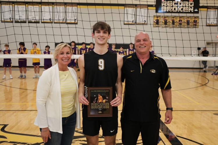 Sam Dore volleyball record.JPG