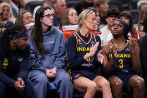 Indiana Fever forward Myisha Hines-Allen (2), Indiana Fever guard Caitlin Clark (22), Indiana Fever guard Sophie Cunningham (8)
