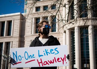 Demonstrators demand Hawley's resignation at downtown protest