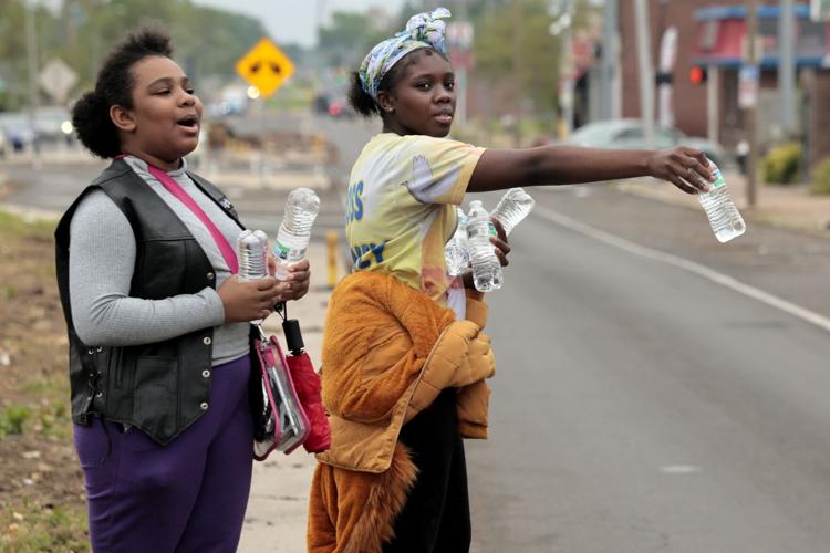 Save-A-Lot parking lot becomes a grassroots community hub for food, clothing and supplies