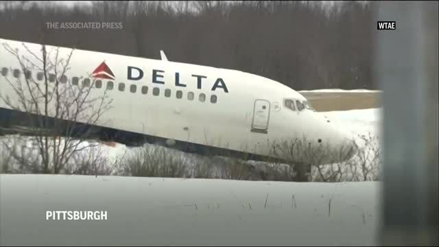 Airplane skids off runway at Pittsburgh airport