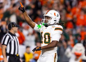 Jan 19, 2026; Miami Gardens, FL, USA; Miami Hurricanes wide receiver Malachi Toney (10) celebrates after scoring a touchdown against the Indiana Hoosiers during the College Football Playoff National Championship game at Hard Rock Stadium. Mandatory C