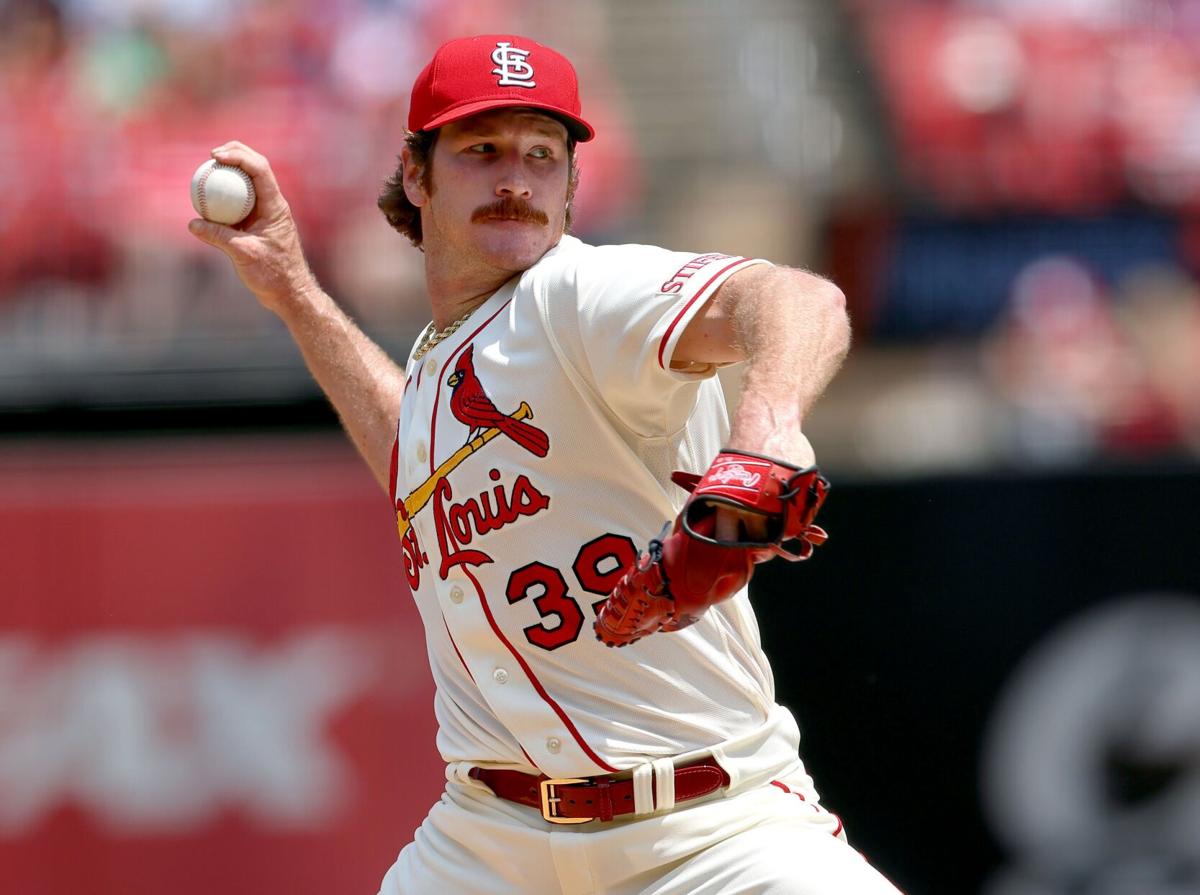 Reds rough Mikolas in 8-4 defeat of Cardinals