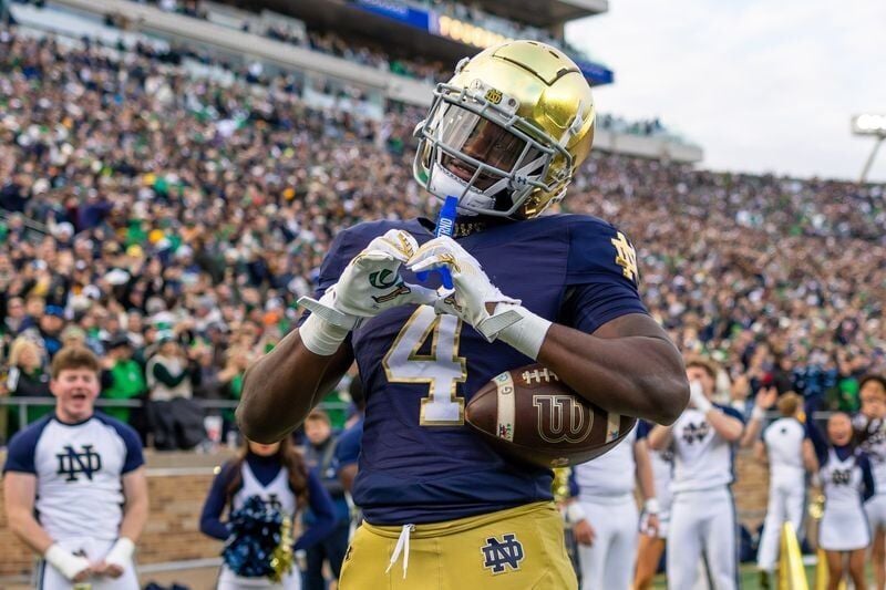 Notre Dame Fighting Irish running back Jeremiyah Love celebrates after scoring against the Syracuse Orange during the first half on Nov. 22 at Notre Dame Stadium.