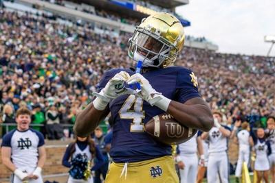 Notre Dame Fighting Irish running back Jeremiyah Love celebrates after scoring against the Syracuse Orange during the first half on Nov. 22 at Notre Dame Stadium.