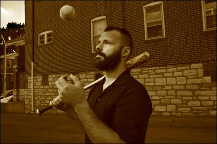 A found metal bat, a tennis ball and a St. Louis alley teaches Bosnian the game of baseball