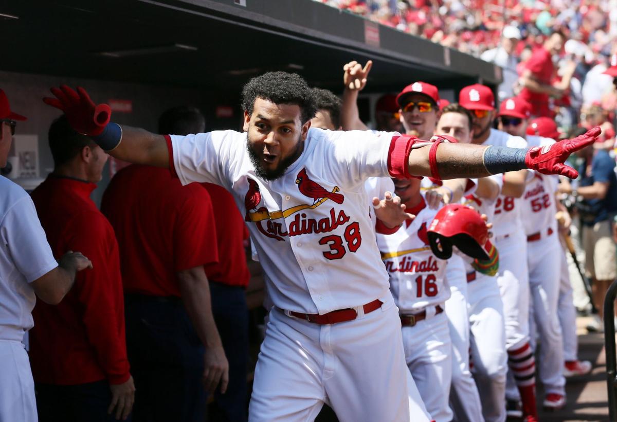 St. Louis Cardinals' Jose Martinez scores the winning run during