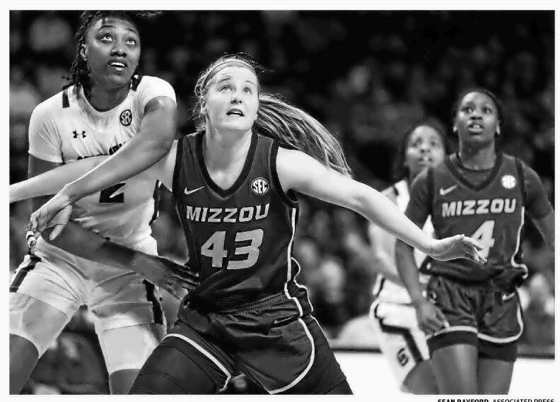 Veteran Frank leads MU's women's basketball team