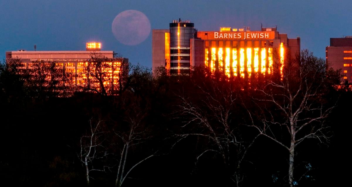 Supermoon rises over healthcare workers