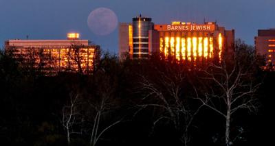 Supermoon rises over healthcare workers