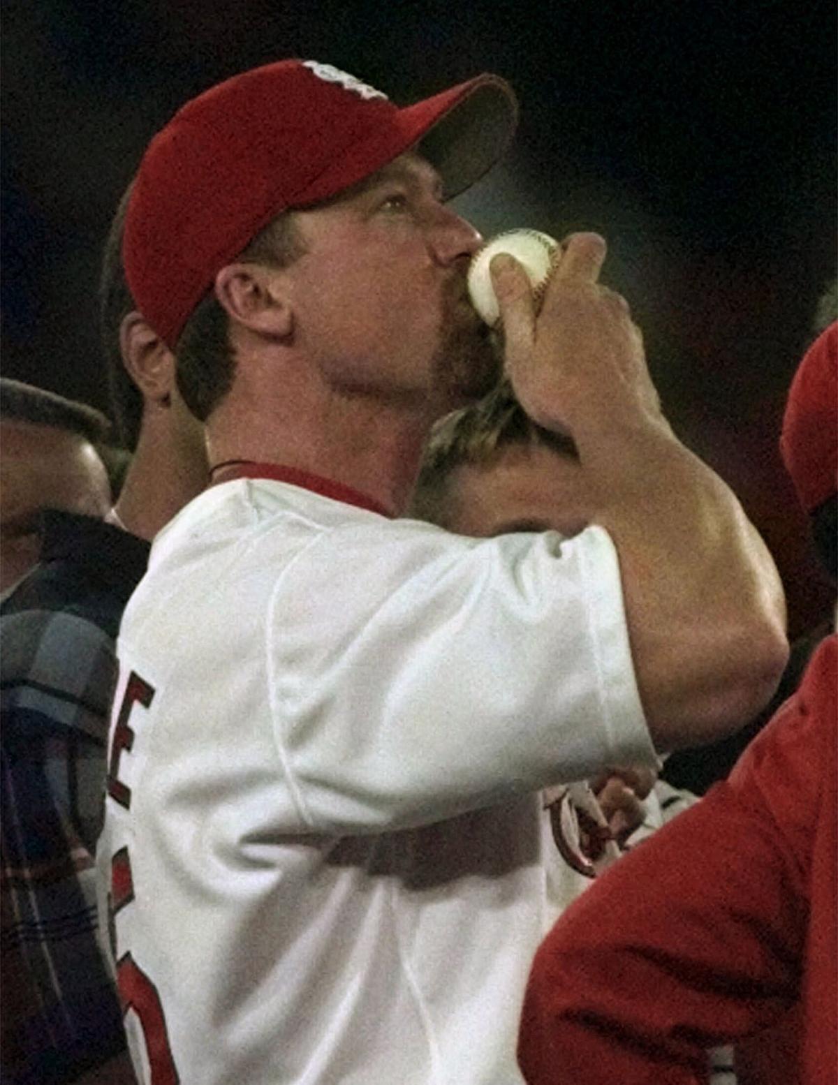 Mark McGwire of the St. Louis Cardinals hits a 341- feet line