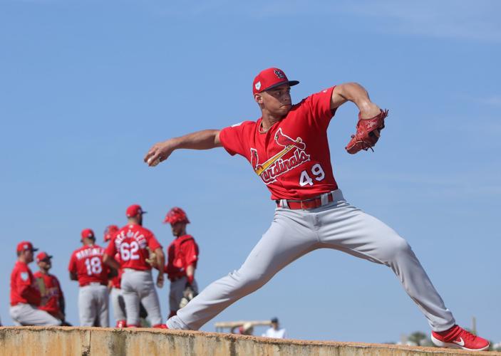 Umpire makes Cardinals pitcher Jordan Hicks switch gloves