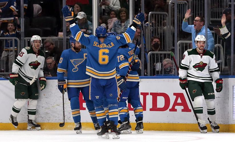 Wild beat Blues 5-3 to keep pace in Central Division