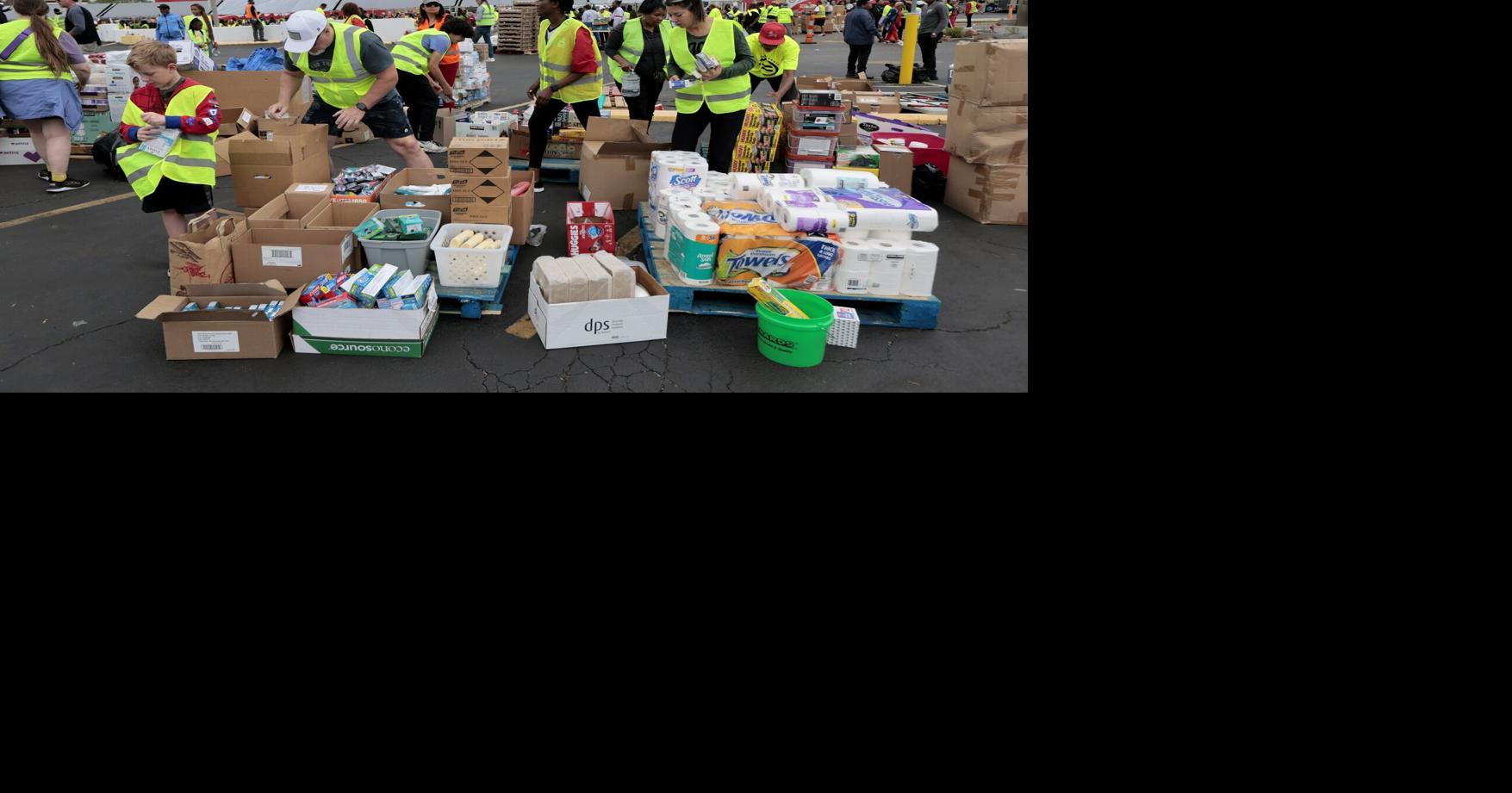 Image for article Thousands get food, supplies at Urban League of St. Louis event. More relief is planned.