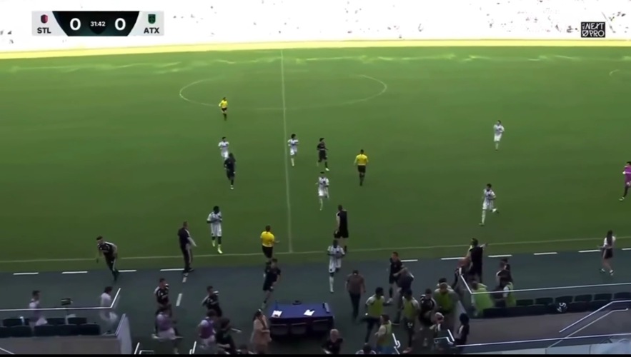 Players evacuate the pitch after shots fired outside �����Ӱ�ԭ�� soccer stadium