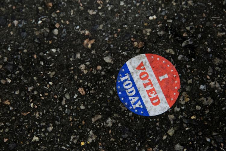 An "I voted today" sticker is seen on the ground at Philadelphia's City Hall, an early voting location for the upcoming presidential election, in Philadelphia, Pennsylvania