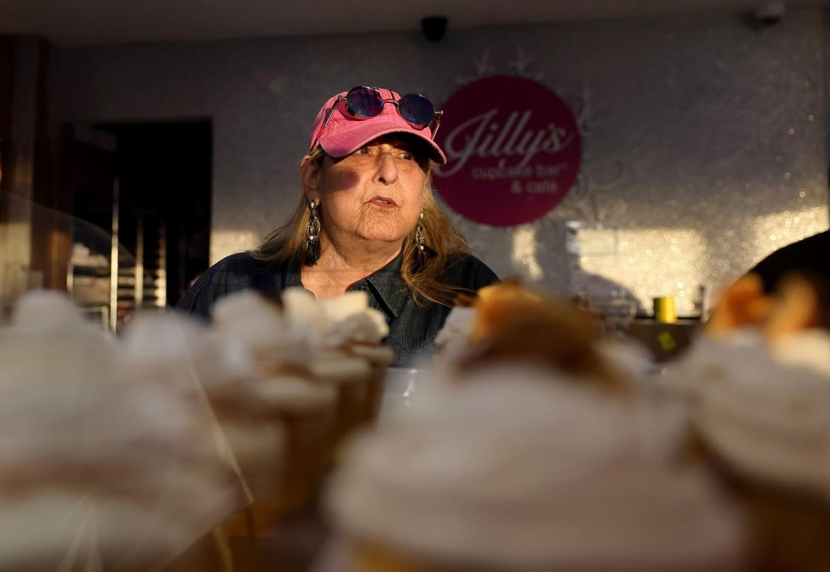 Jill Segal works behind the counter at her shop, Jilly’s Cupcake Bar and Cafe in University City, on Thursday, Nov. 6, 2025. Segal died recently, and the business is now looking for investors.