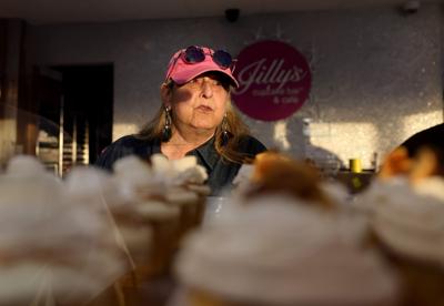Jill Segal works behind the counter at her shop, Jilly’s Cupcake Bar and Cafe in University City, on Thursday, Nov. 6, 2025. Segal died recently, and the business is now looking for investors.