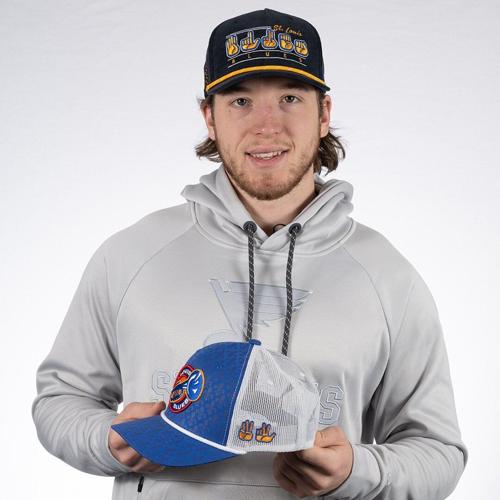 Blues launch new hat line designed by forward Jake Neighbours
