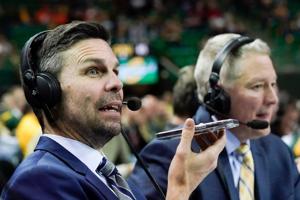 Jan 14, 2023; Waco, Texas, USA; ESPN announcers Chris Spatola and Mark Neely that were working game the between the Baylor Bears and the Oklahoma State Cowboys had to call the game via a cell phone after a power outage during the second half at Ferrell Cen