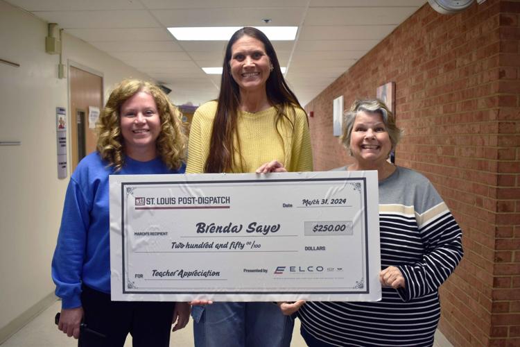 Brenda Saye poses with her prize