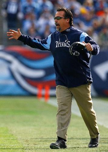 Former Tennessee Titans coach Jeff Fisher gets help lining up his