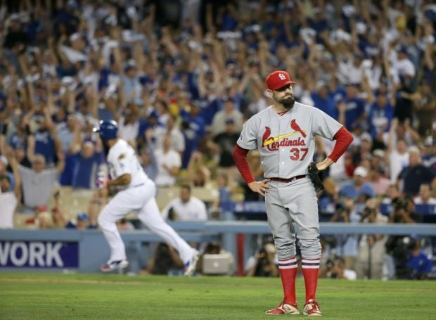 Today in postseason history: Cardinals found themselves with their backs  against the wall in 2010s​