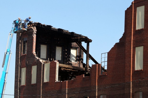 Wind damages old factory under renovation as apartments