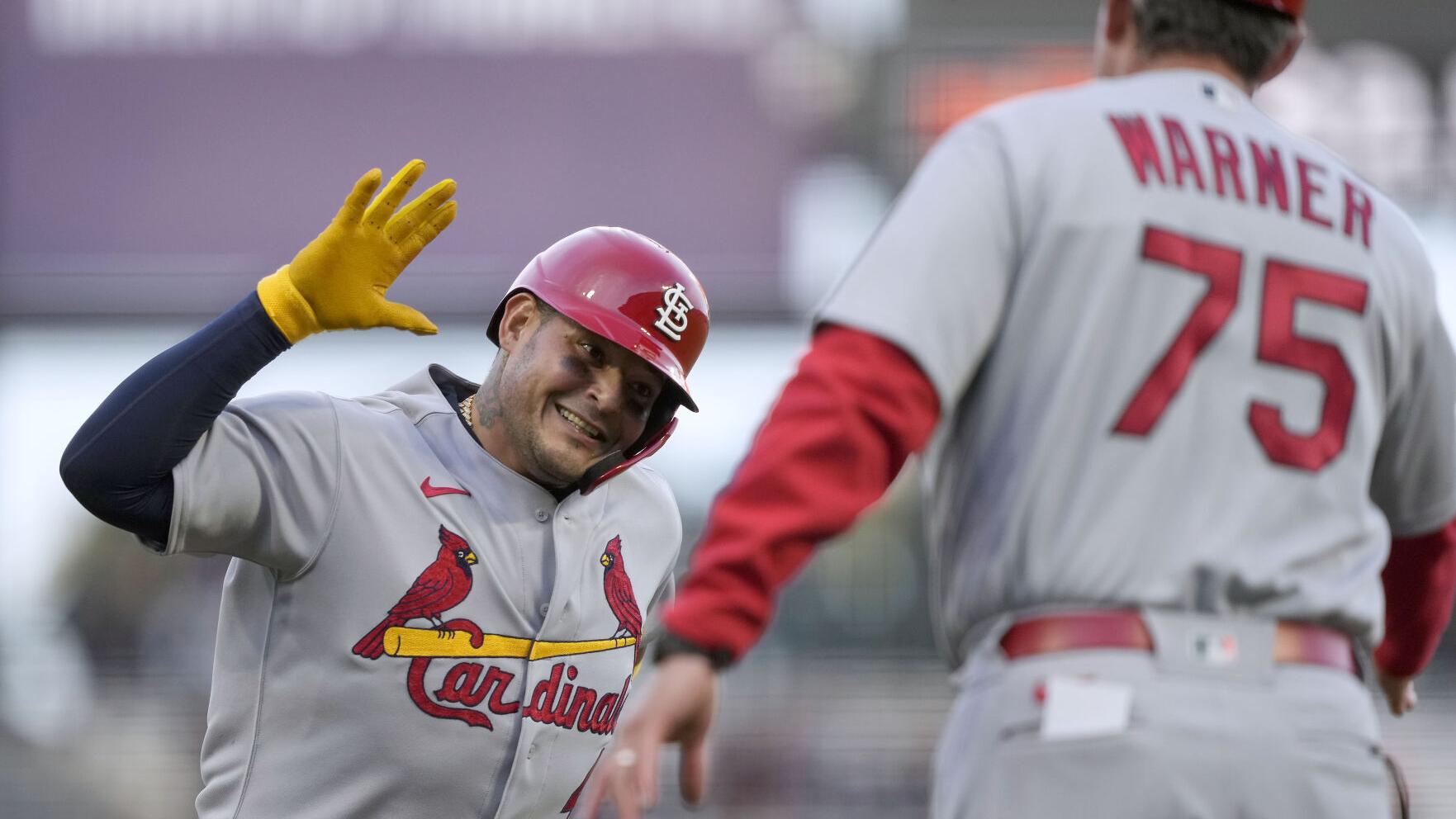 Molina's first homer of season starts Cardinals' 7-1 romp against nine Giants' pitchers